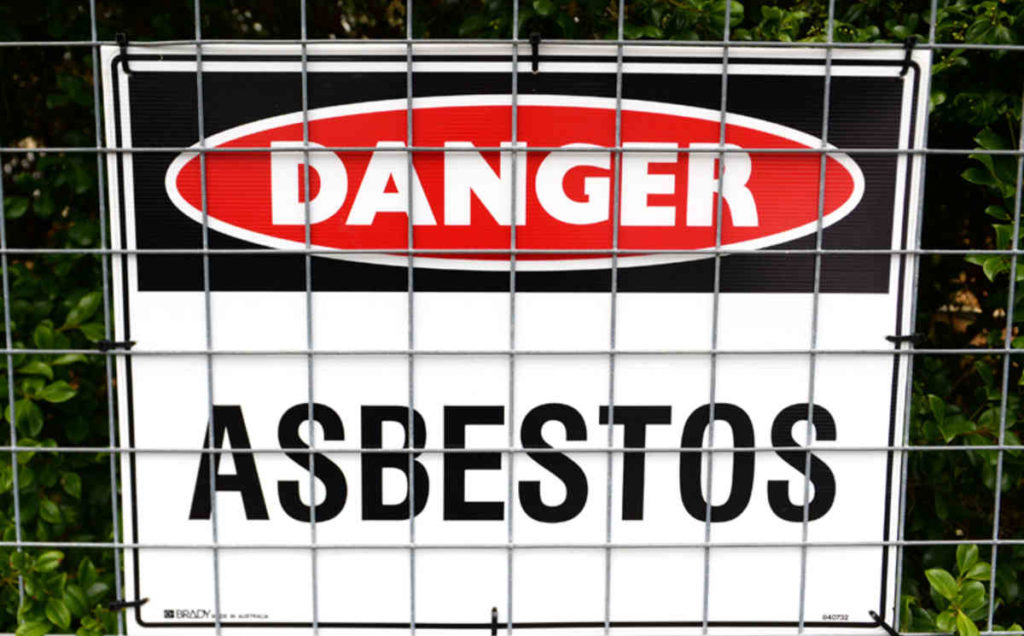 A stock image of an asbestos warning sign Friday, March 21, 2014. (AAP Image/Dan Peled) NO ARCHIVING